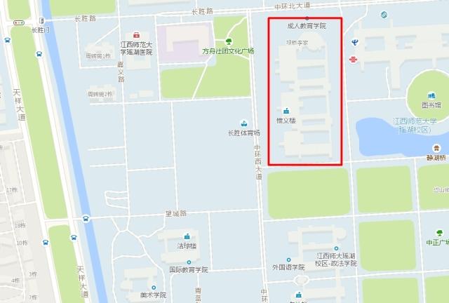 江西师范大学的惟义楼和先骕楼对着,在图书馆的侧面.