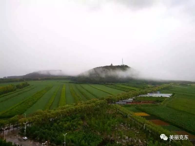 实拍克东狂风暴雨水漫县城!二克山若隐若现似仙境!