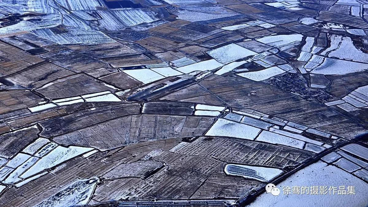 然而黑龙江松花江两岸黑土地上春雪覆盖分外又是一番新景象!