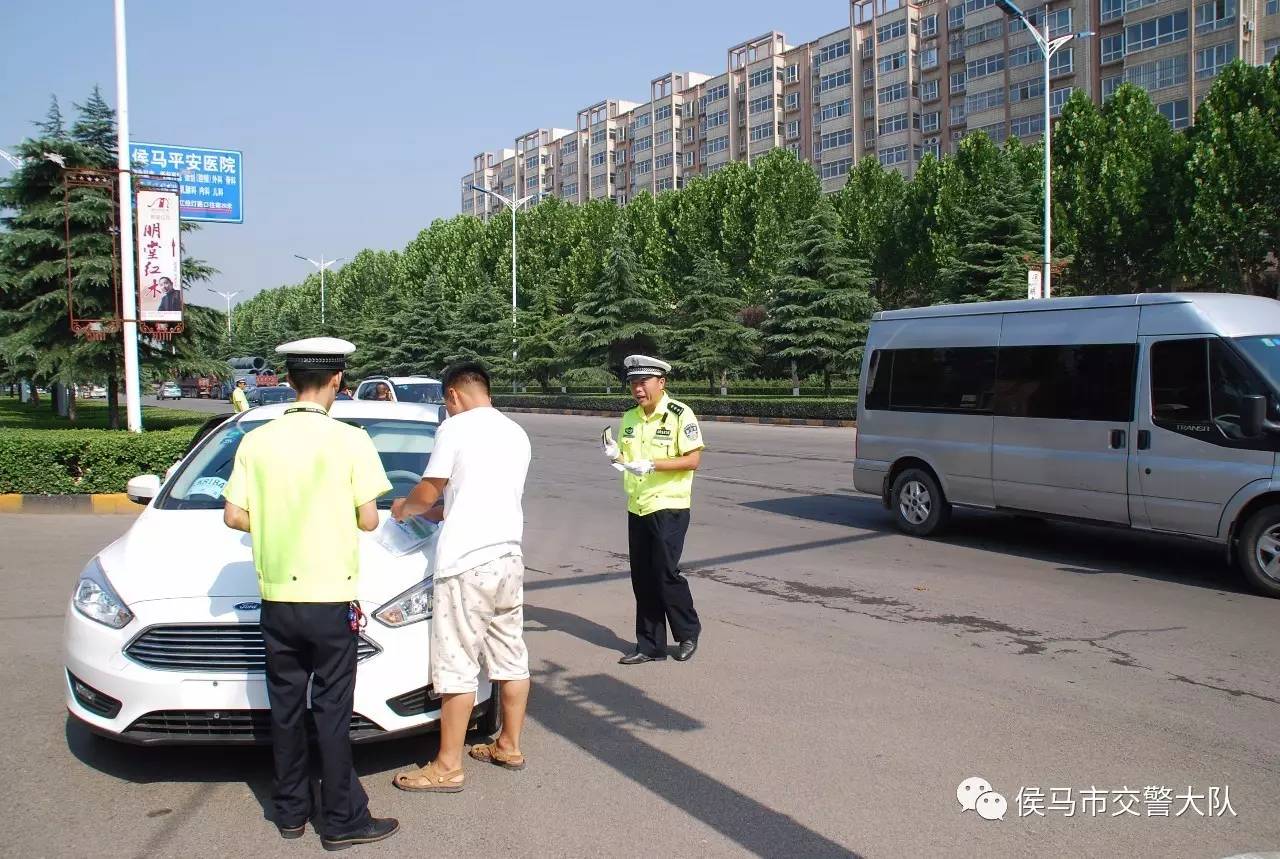 熱聞高溫保平安愛心送清涼愛心企業為侯馬一線交警送去防暑用品